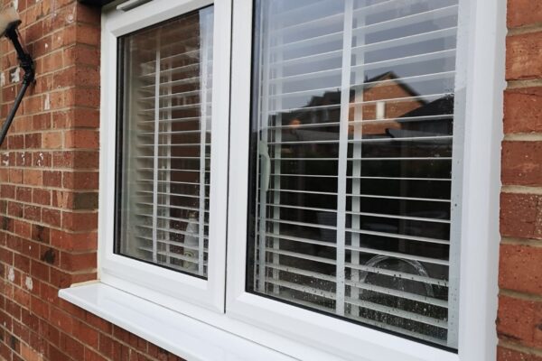 a shiny double galzed window after being cleaned