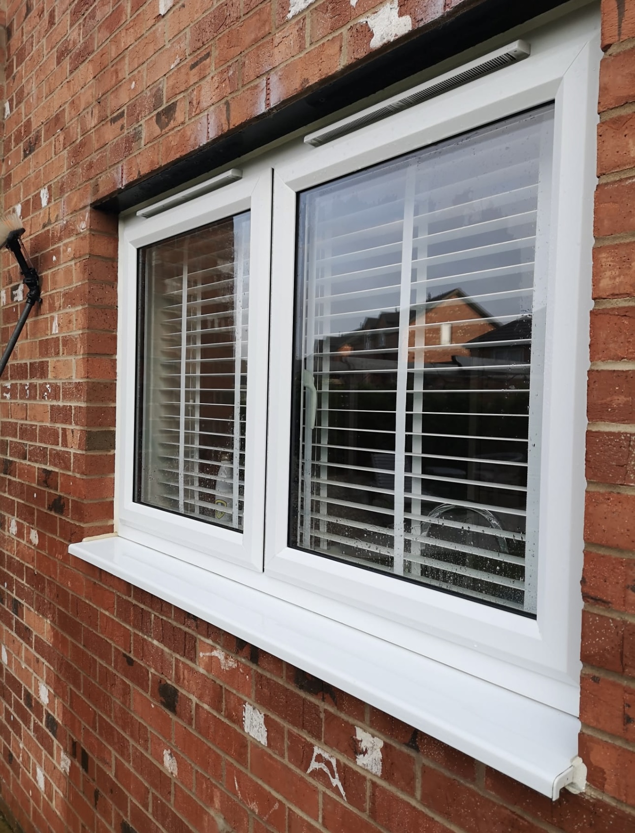a shiny double galzed window after being cleaned